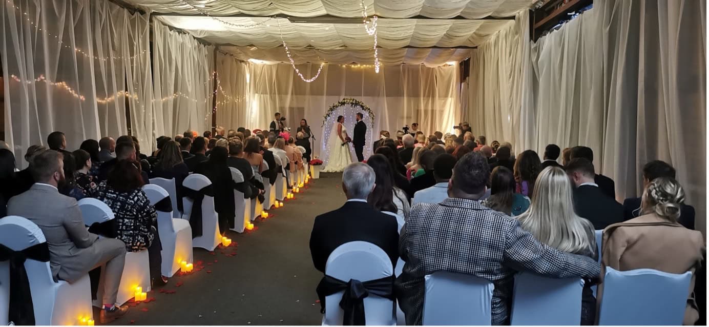 Wedding ceremony with seated guests